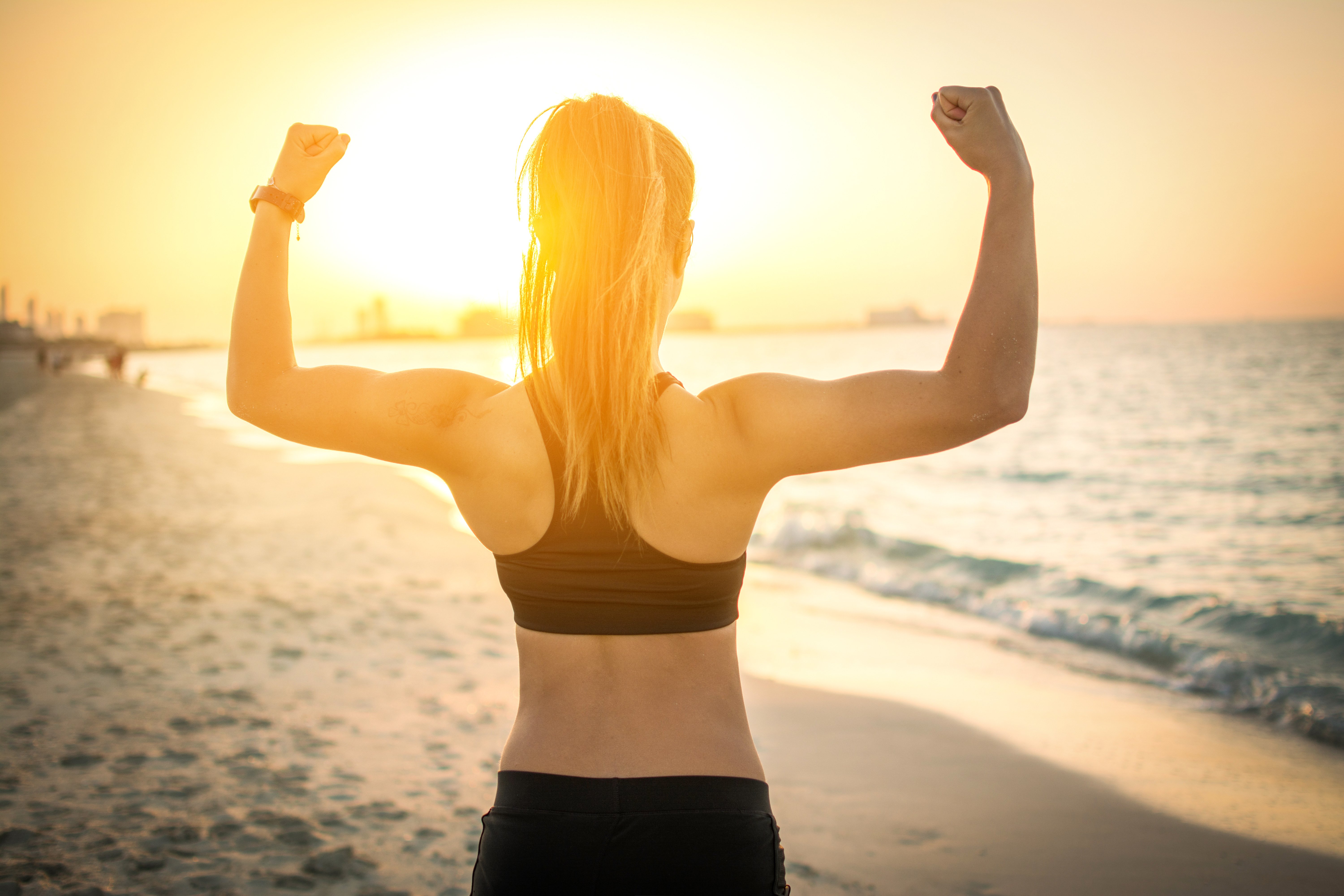 Woman showing off muscles 