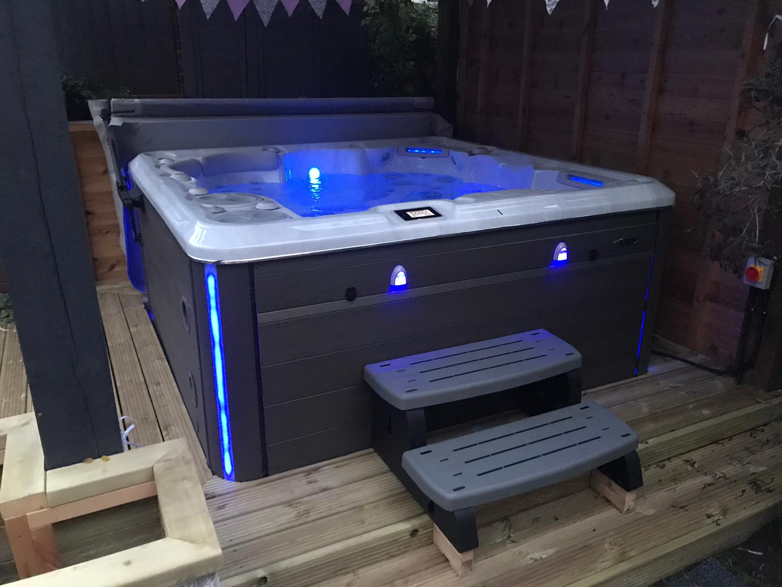 Hot tub lit up with southern lights package